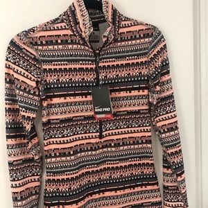 NIKE PRO Women’s Training jacket size XS. 1/4 zip pull over. New with tags.
